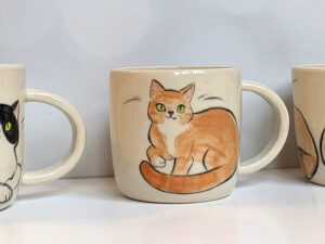 three cat portrait mugs