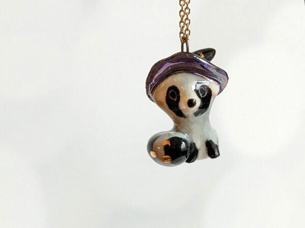 porcelain pendant witch hat raccoon