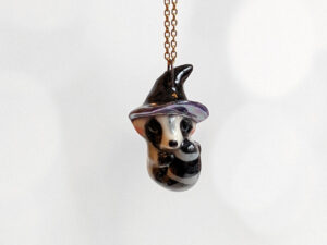 porcelain pendant witch hat raccoon