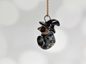 porcelain pendant witch hat raccoon