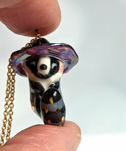 porcelain pendant witch hat raccoon