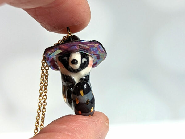 porcelain pendant witch hat raccoon