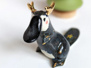 antlered platypus porcelain figurine