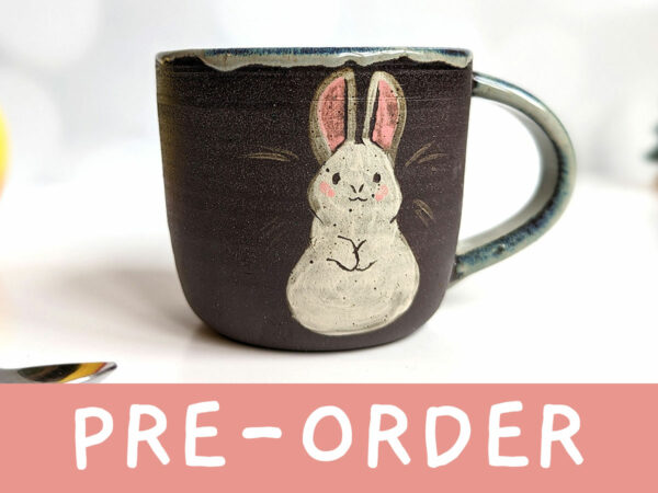 pre-order black stoneware mug with bunnies