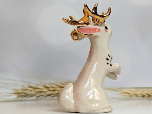 jackalope figurine with golden antlers