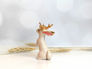 jackalope figurine with golden antlers