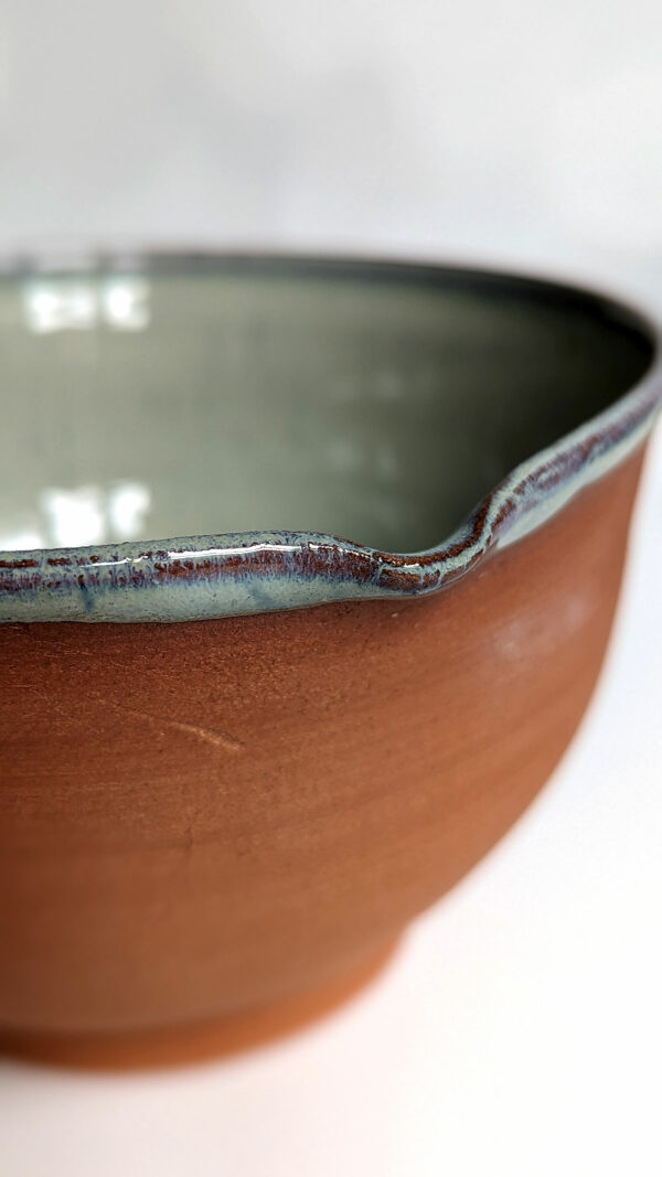 cute otter bowl for matcha in red clay and blue glaze