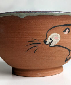 cute otter bowl for matcha in red clay and blue glaze