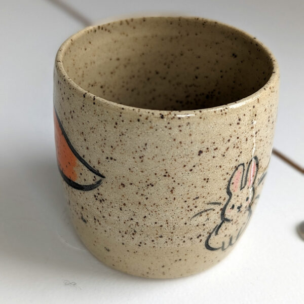 cute cup in speckled clay illustrated with fox and hare - kness