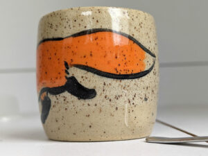 cute cup in speckled clay illustrated with fox and hare - kness