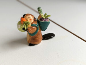 cute beaver holding vegetables figurine porcelain kness