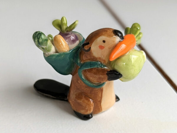 cute beaver holding vegetables figurine porcelain kness