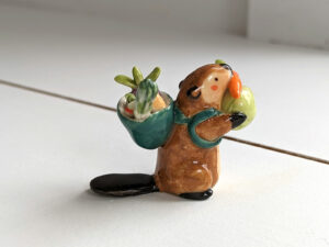cute beaver holding vegetables figurine porcelain kness