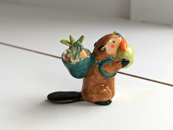 cute beaver holding vegetables figurine porcelain kness
