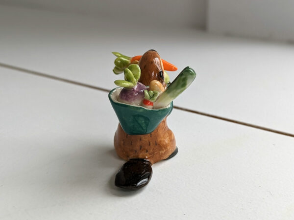cute beaver holding vegetables figurine porcelain kness