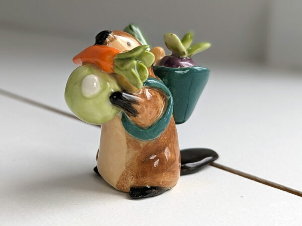 cute beaver holding vegetables figurine porcelain kness