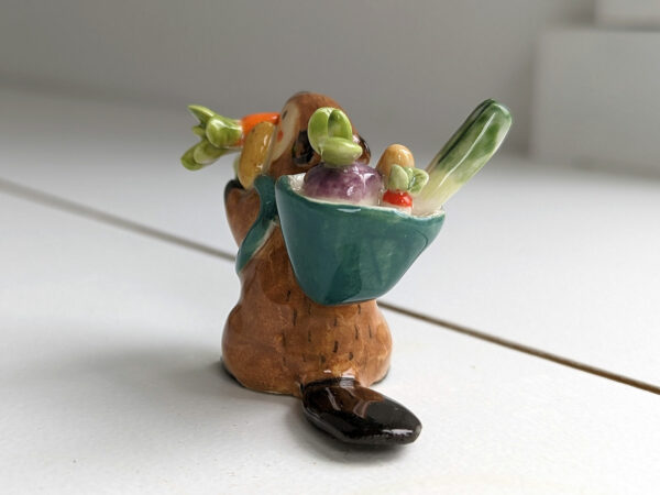 cute beaver holding vegetables figurine porcelain kness