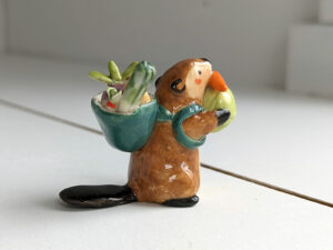 cute beaver holding vegetables figurine porcelain kness