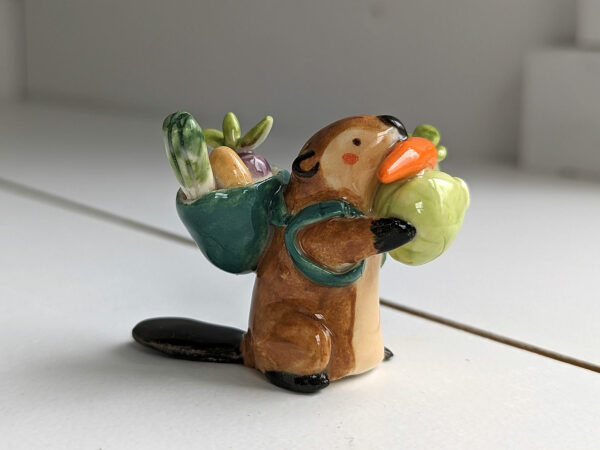 cute beaver holding vegetables figurine porcelain kness