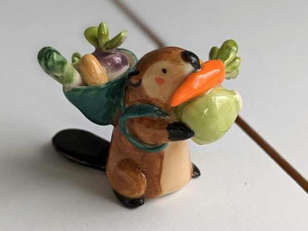 cute beaver holding vegetables figurine porcelain kness