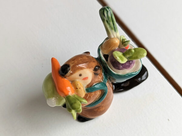 cute beaver holding vegetables figurine porcelain kness
