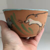 cute otter bowl for matcha in red clay and blue glaze