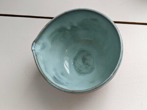 cute otter bowl for matcha in red clay and blue glaze