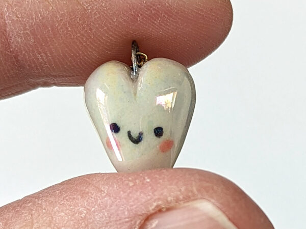 cute white porcelain heart pendant with pink cheeks