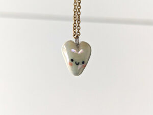 cute white porcelain heart pendant with pink cheeks