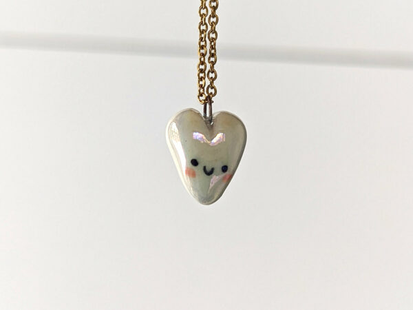 cute white porcelain heart pendant with pink cheeks