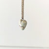 cute white porcelain heart pendant with pink cheeks