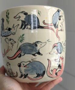 big planter with 32 cute opossums, hand painted and one of a kind,