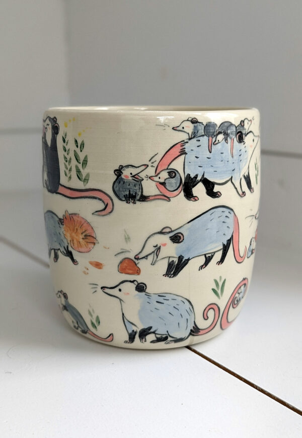 big planter with 32 cute opossums, hand painted and one of a kind,