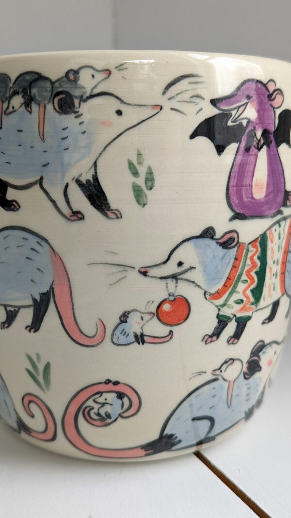 big planter with 32 cute opossums, hand painted and one of a kind,