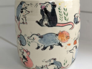 big planter with 32 cute opossums, hand painted and one of a kind,