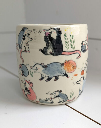 big planter with 32 cute opossums, hand painted and one of a kind,