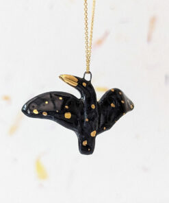 porcelain pendant crow gold with wings out