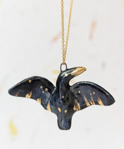 porcelain pendant crow gold with wings out