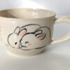tea cup white bunnies