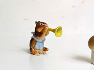 chipmunk trumpet apron porcelain figurine