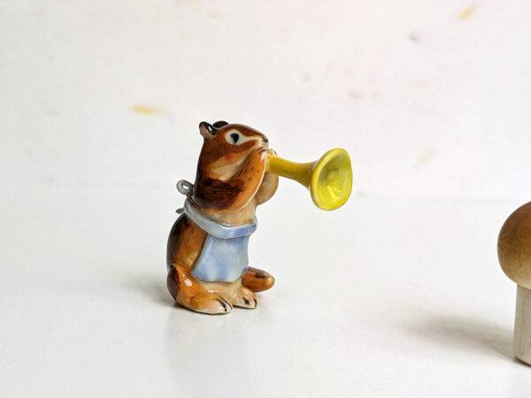 chipmunk trumpet apron porcelain figurine