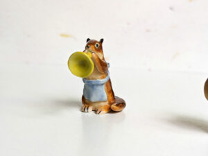 chipmunk trumpet apron porcelain figurine