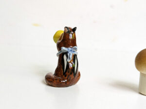 chipmunk trumpet apron porcelain figurine