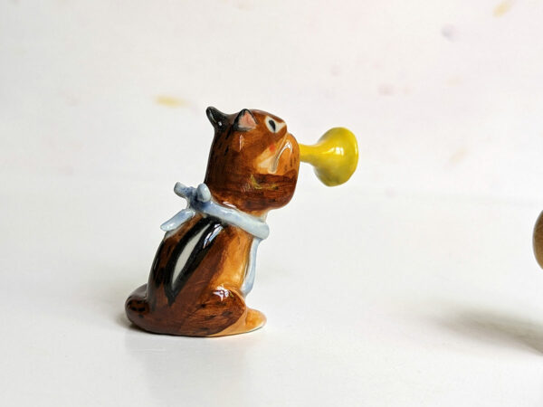 chipmunk trumpet apron porcelain figurine