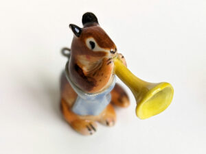 chipmunk trumpet apron porcelain figurine