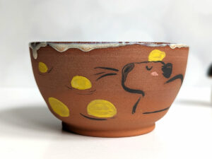 capybara red stoneware bowl with citrus bath