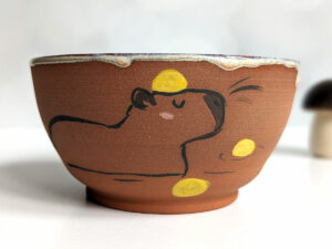 capybara red stoneware bowl with citrus bath