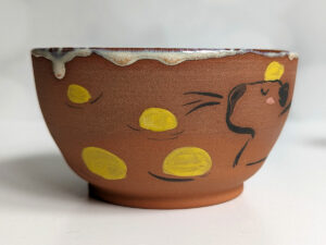 capybara red stoneware bowl with citrus bath