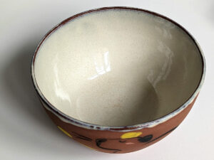 capybara red stoneware bowl with citrus bath