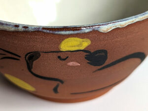 capybara red stoneware bowl with citrus bath